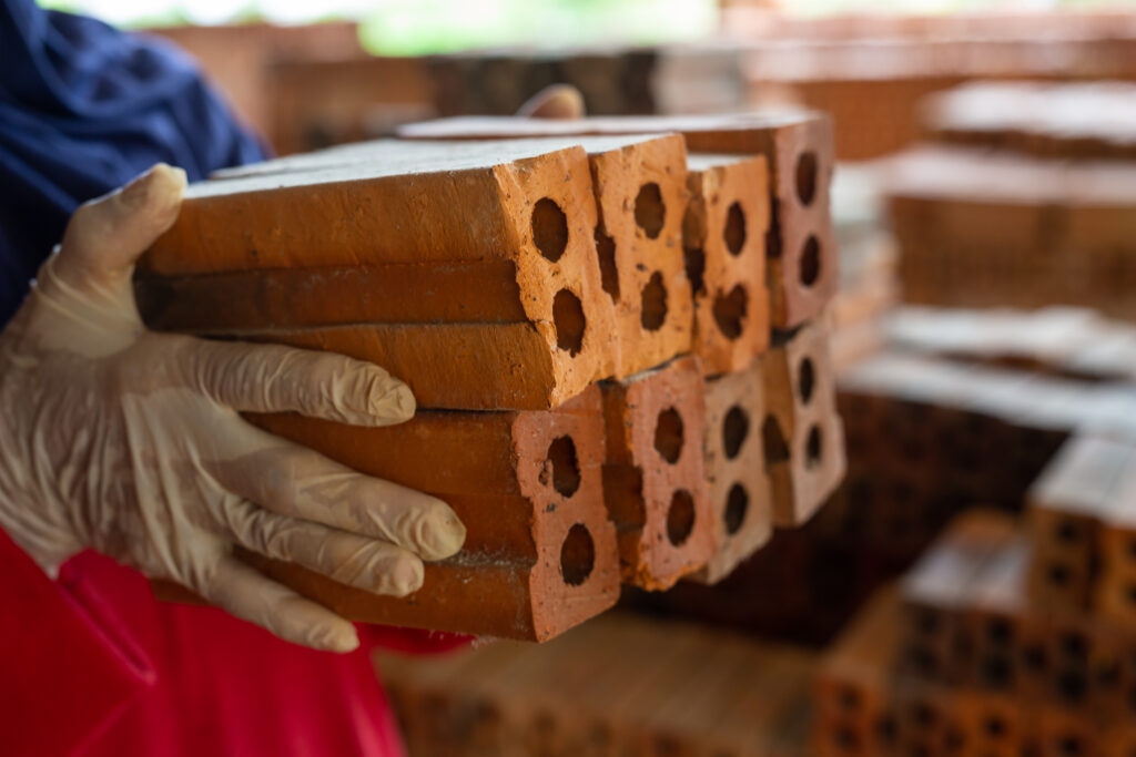 brick piles placed on the factory floor.